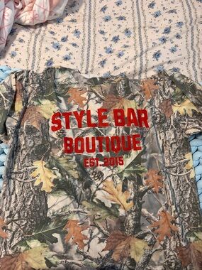 STYLE BAR BOUTIQUE Camouflage Graphic Tee with Red Logo